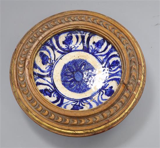 A Safavid Fritware blue and white pottery dish diameter 24cm